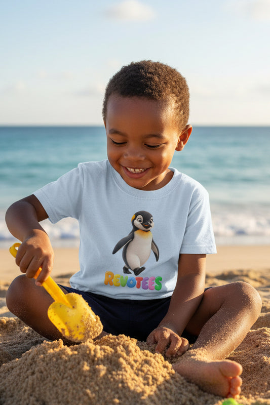 REVOTEES Kids Tee — Cute Pebble Penguin “REVOTEES” Colorful Logo